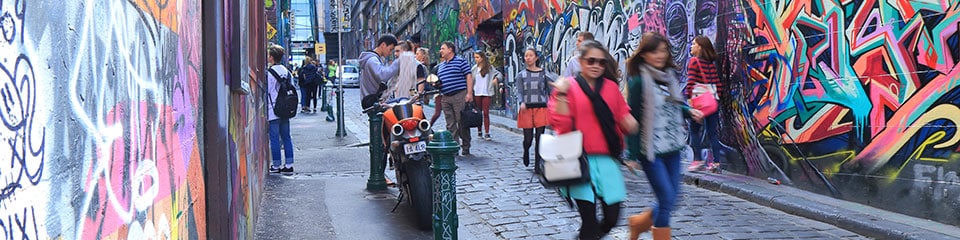 Melbourne locals in an inner city area filled with street art.